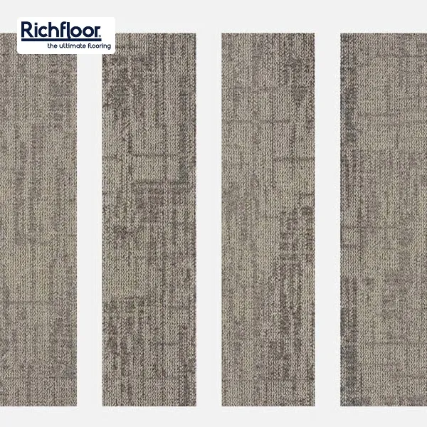 Sản phẩm thảm tấm nâu vàng phù hợp cho văn phòng, showroom và không gian sinh hoạt.